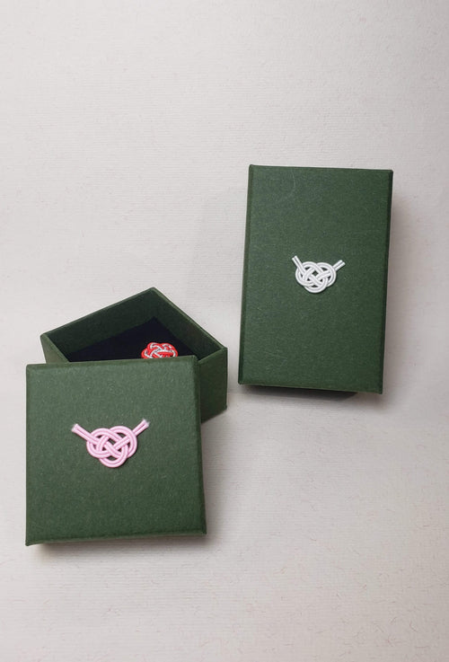 Close-up of 2 size of green jewelry box for gift with mizuhiki awaji knot,  by itookasi