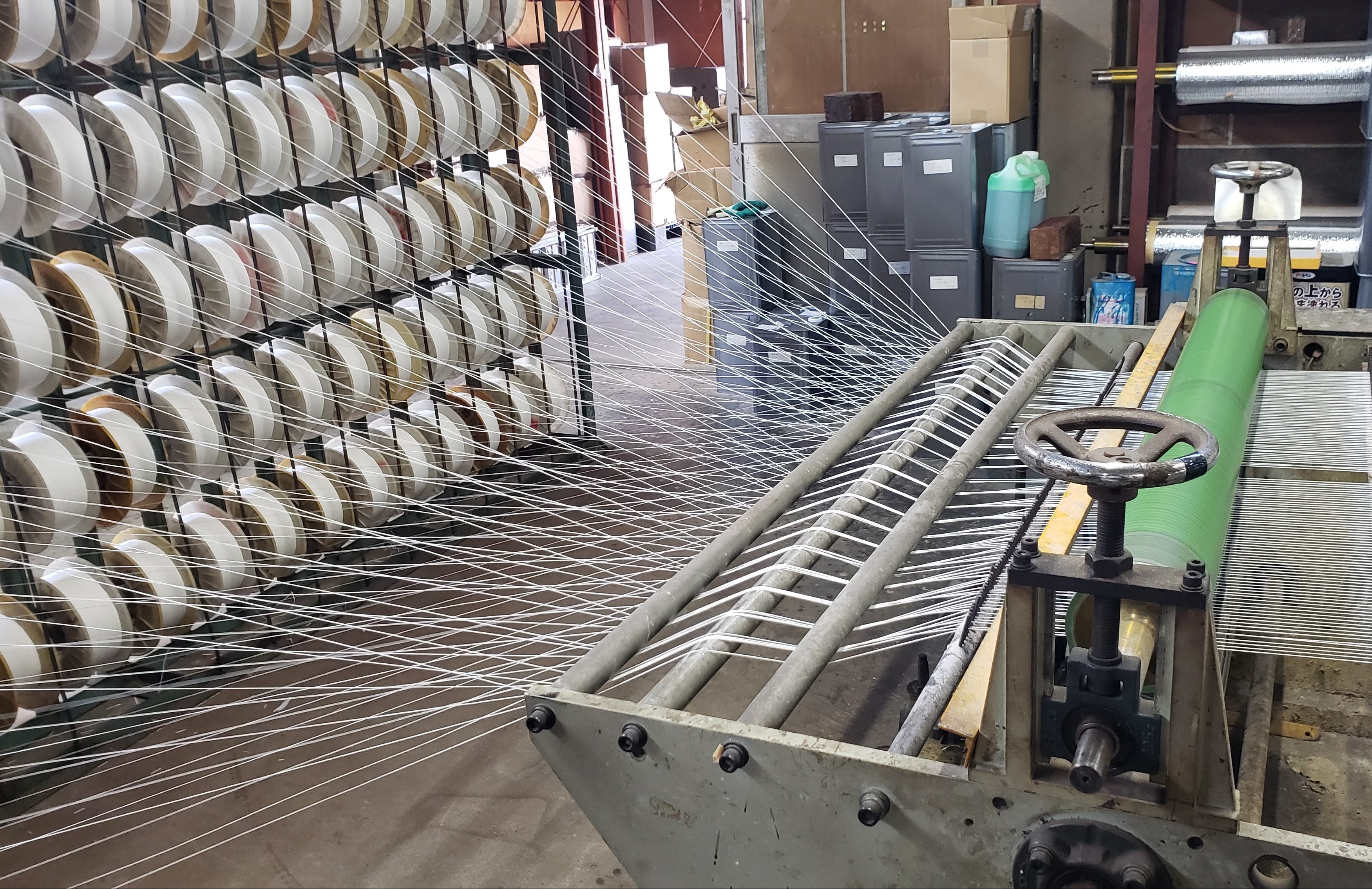Close-up of the machinery used in the production process of mizuhiki at a mizuhiki factory in Iida City, Nagano Prefecture.