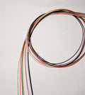 Close-up of Mizuhiki cords in different colors, imported from Japan by Itookasi. 