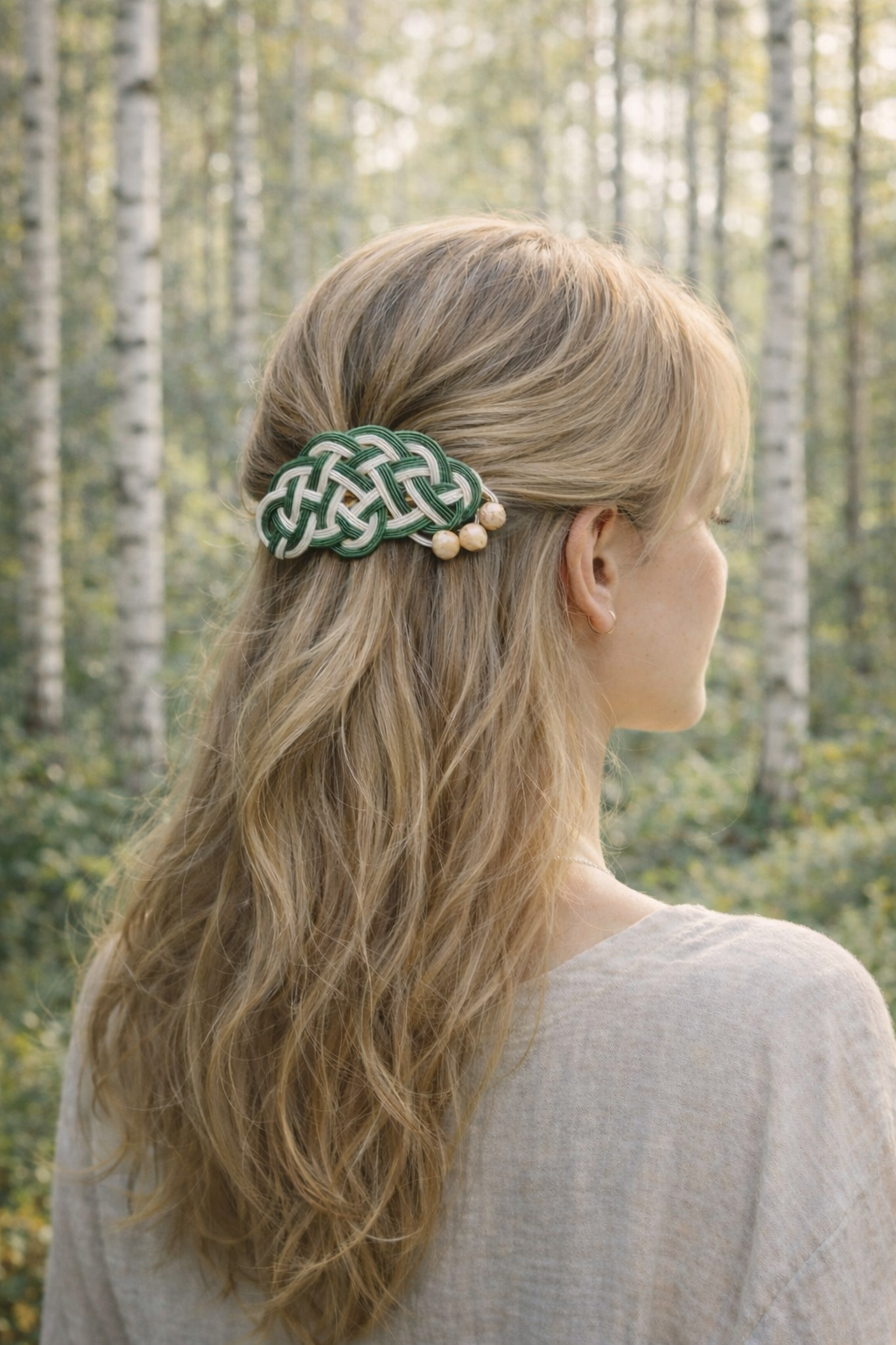 Close-up of a Mizuhiki pine knot hair barrettes in different colors with Finnish wood beads, handmade by Itookasi. A blend of Japanese craft and Finnish nature, symbolizing longevity and happiness.