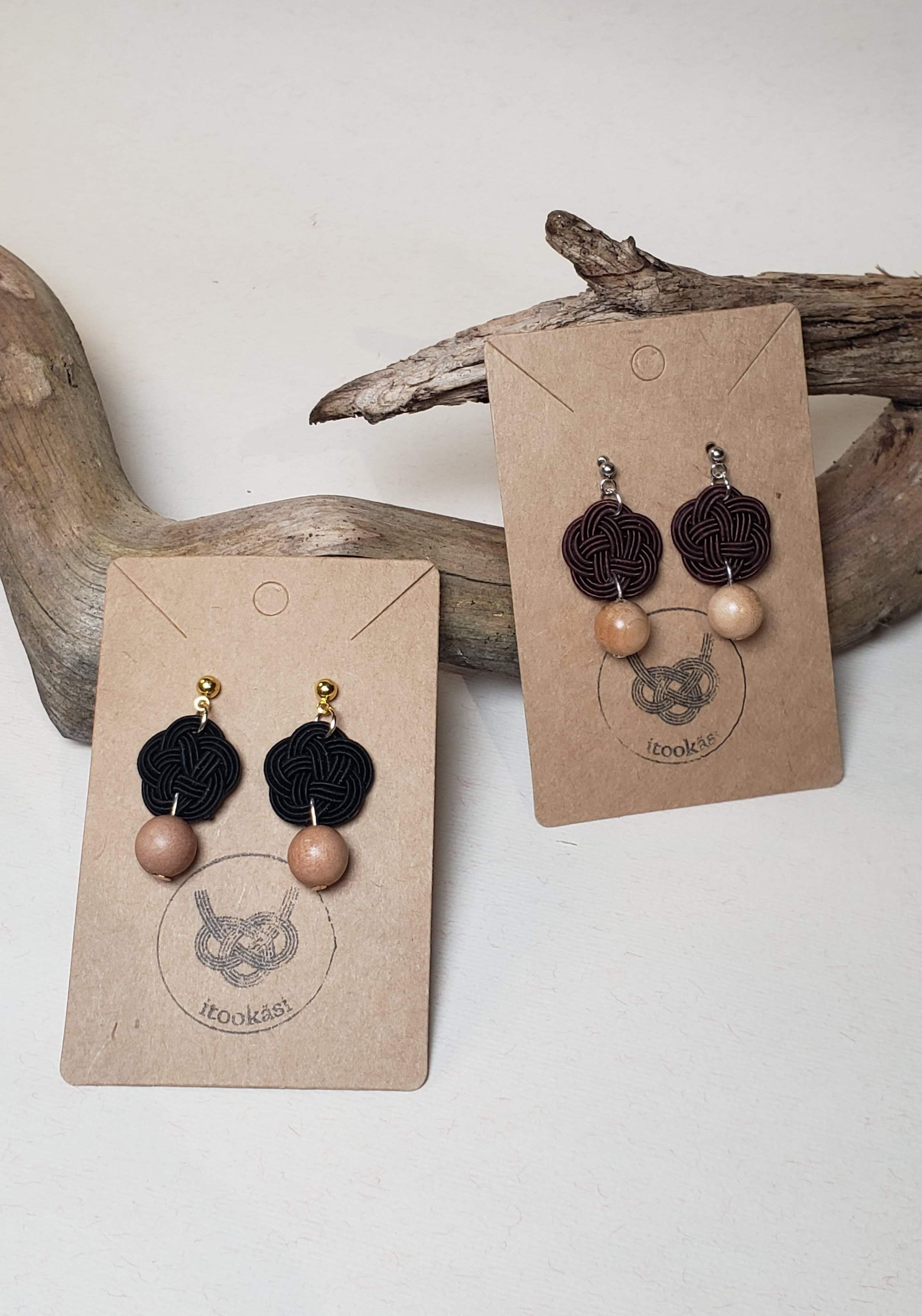 Close-up of olive black and brown plum knot earrings with Finnish wood beads, handmade by Itookasi. A blend of Japanese craft and Finnish nature symbolizing strong bonds.